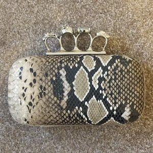 Faux Snakeskin Clutch with Skull Knuckle Rings